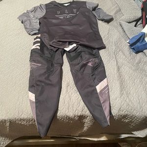Fly jersey and pants both grey, waist size is 30 and jersey size is medium